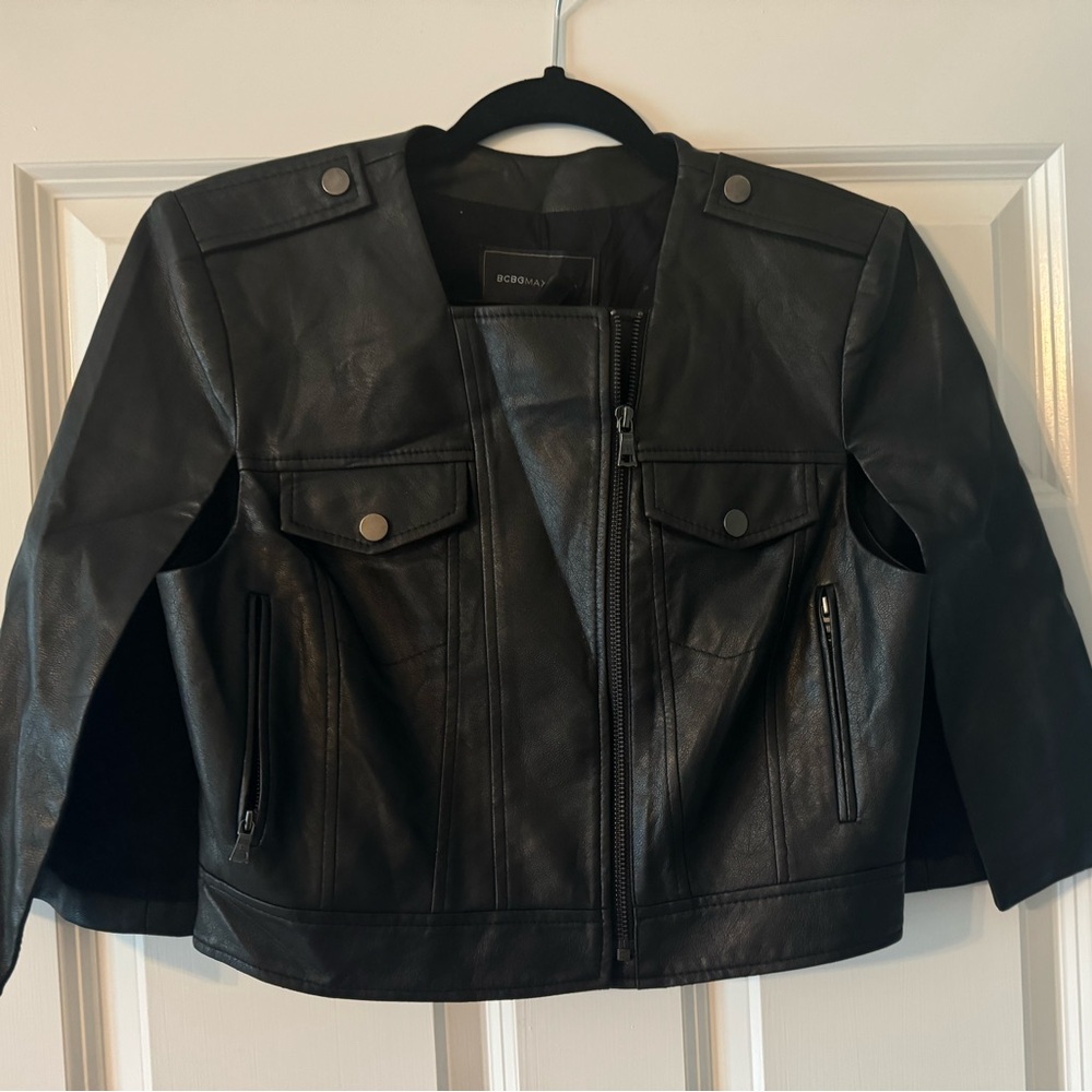 BCBG soft leather jacketed with cape style sleeves